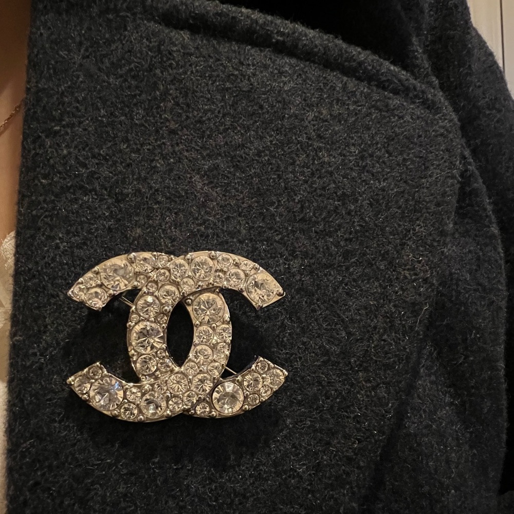 This Chanel crystal logo brooch pin can change the whole look!